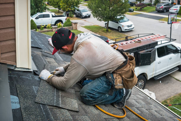 Professional Roof Replacement technician working in Hopkins, MI